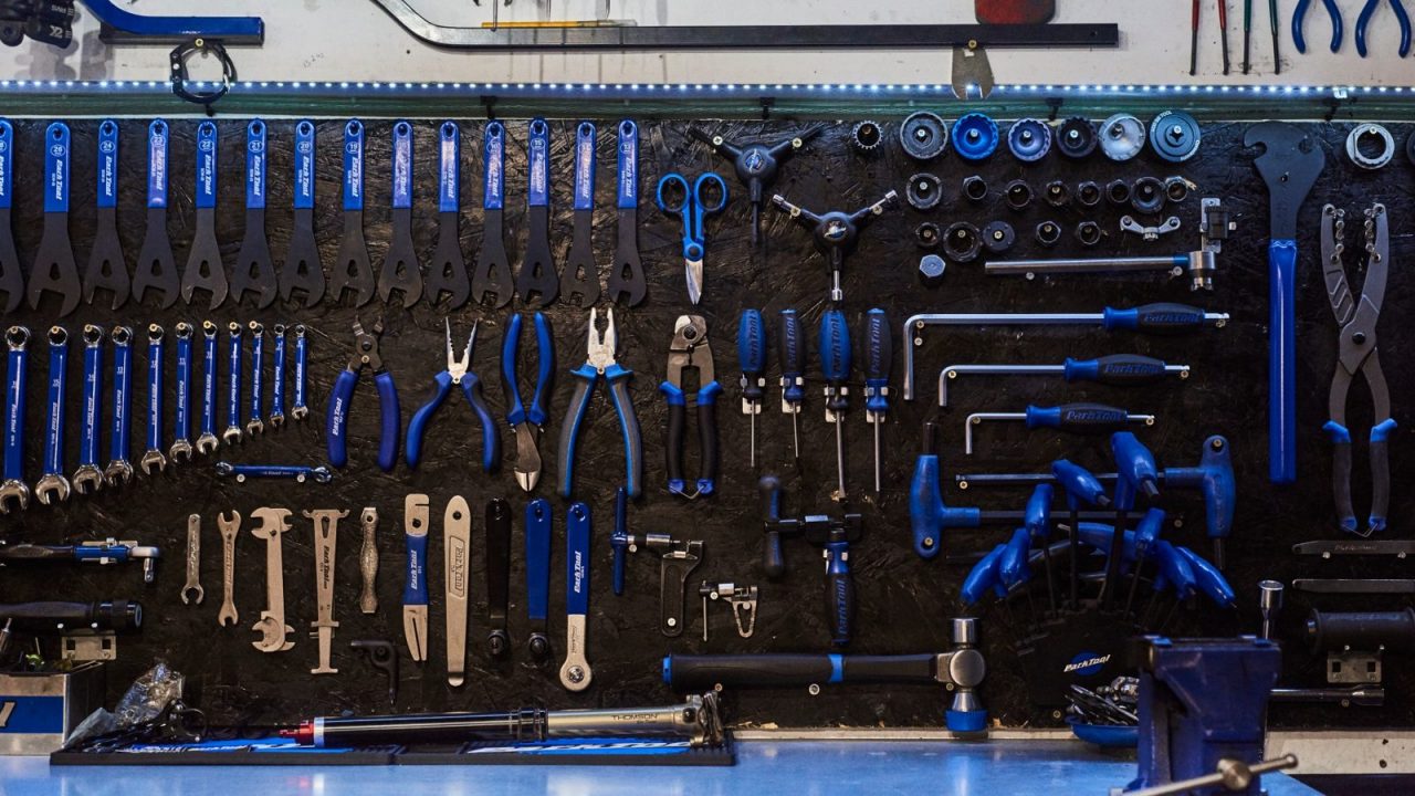Park Tool spanners, pliers and hex keys on the Winstanleys workshop wall